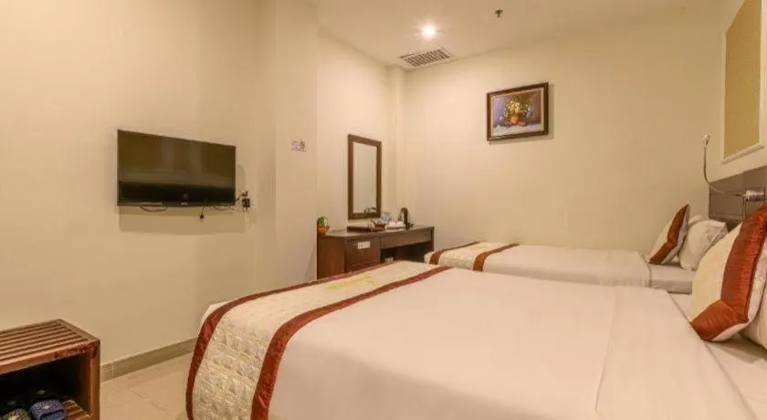 Bed in Ocean View Danang Hotel