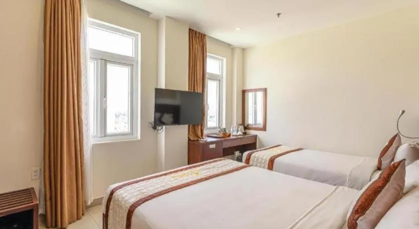 Bed in Ocean View Danang Hotel