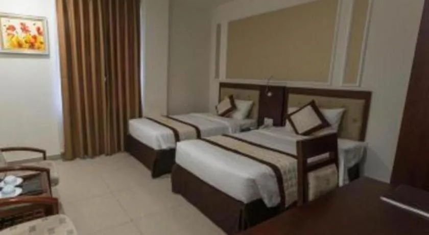 Bed in Ocean View Danang Hotel