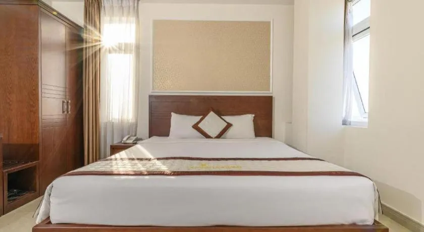 Bed in Ocean View Danang Hotel