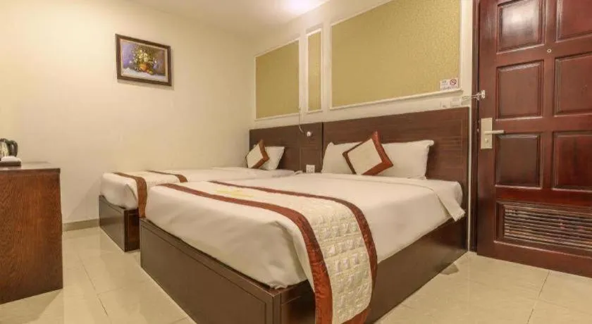 Bed in Ocean View Danang Hotel