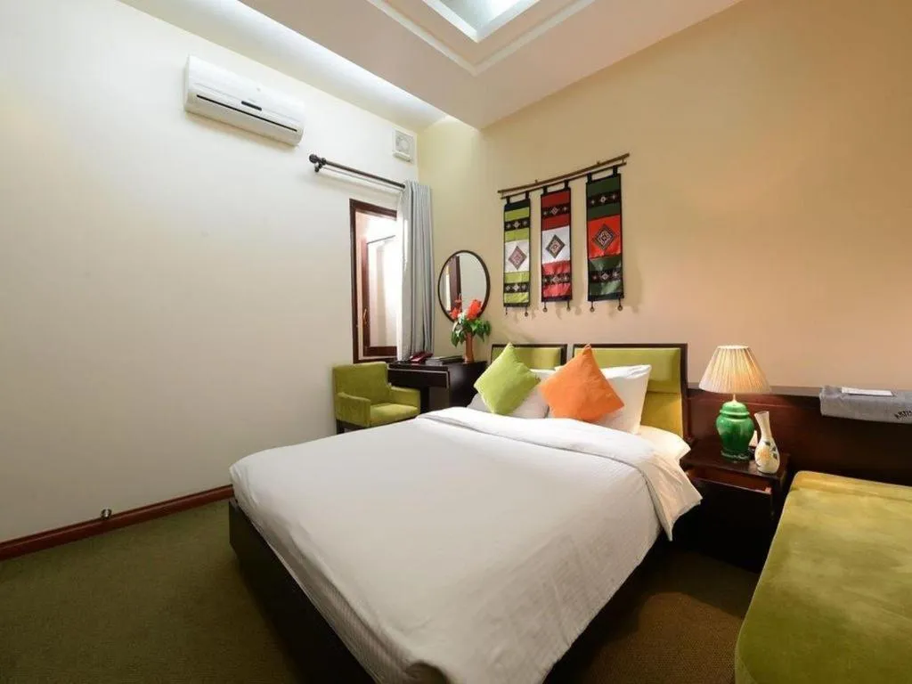 Bed in Artisan Boutique Hotel