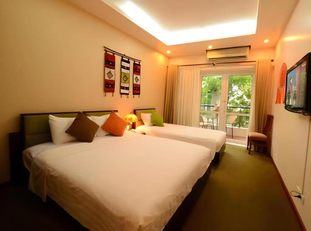 Bed in Artisan Boutique Hotel