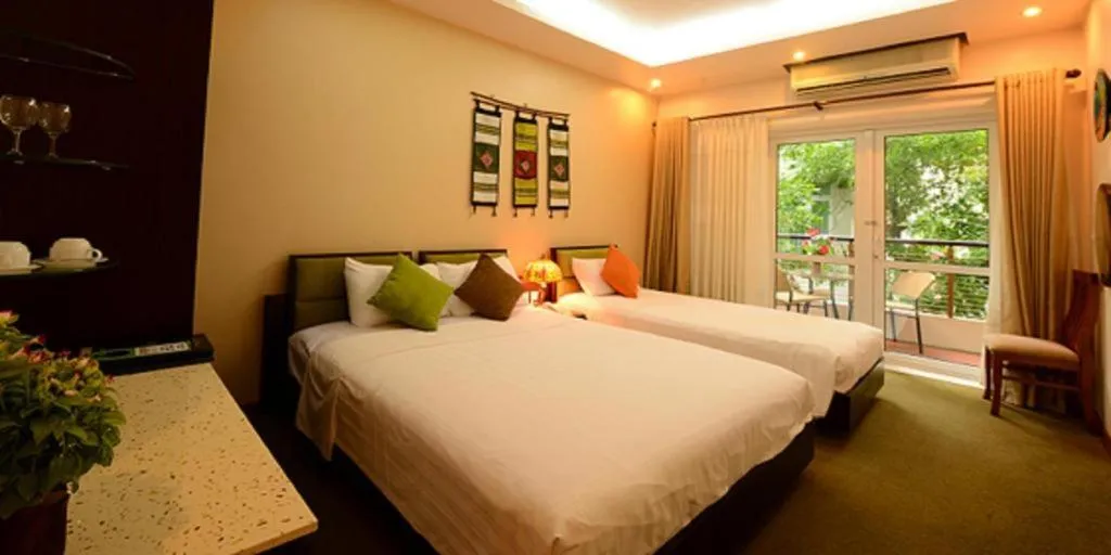 Bed in Artisan Boutique Hotel