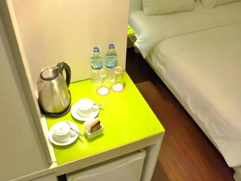 Bed in Everbright Ambon Hotel