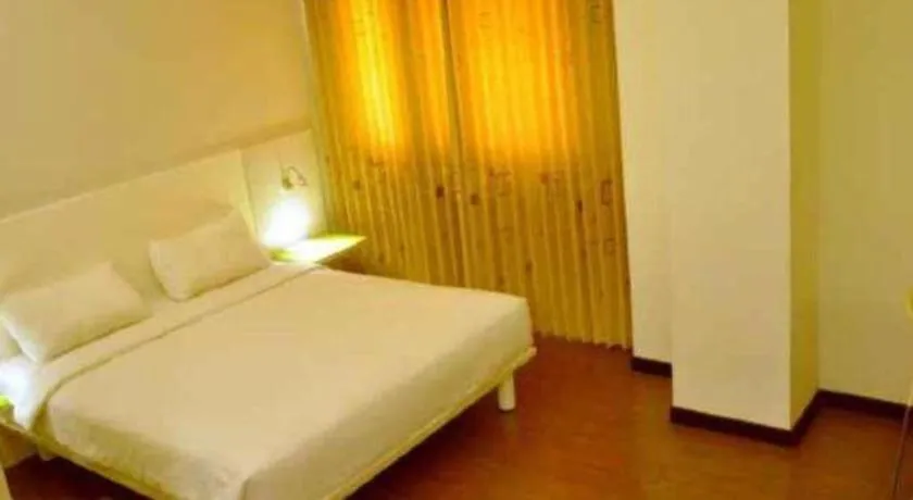 Bed in Everbright Ambon Hotel