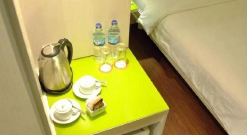 Bed in Everbright Ambon Hotel