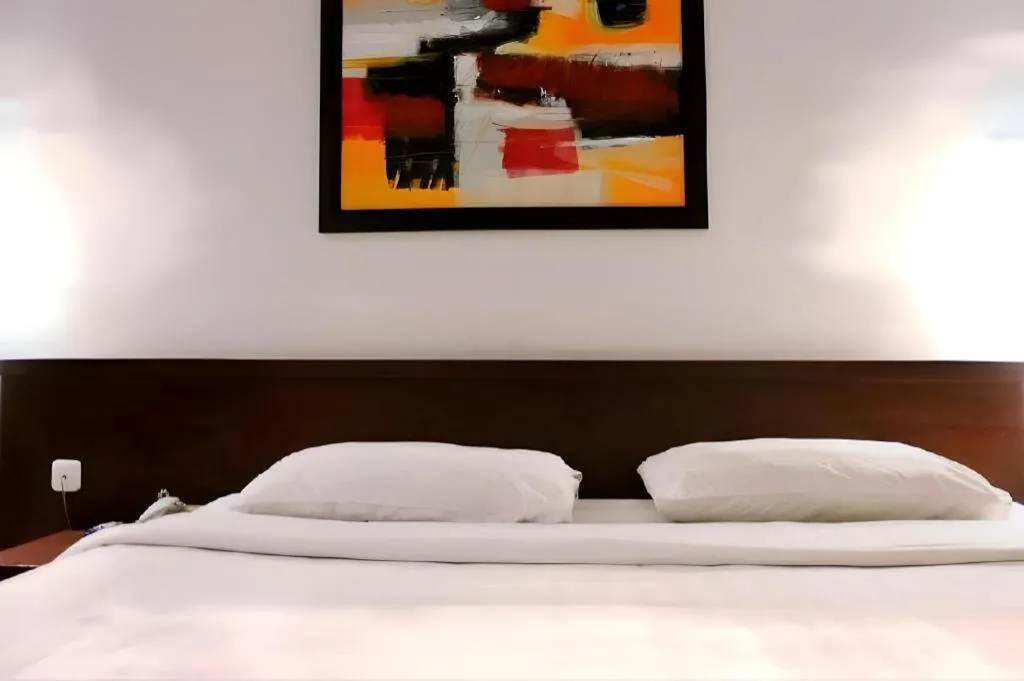 Bed in Sofyan Hotel Soepomo