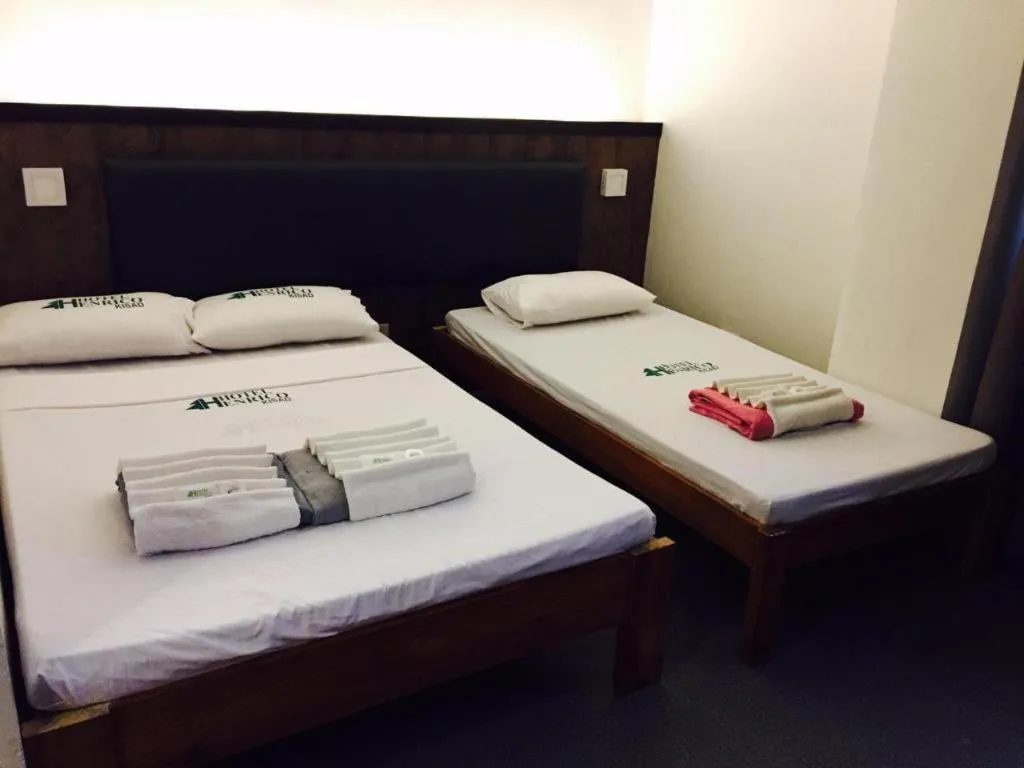 Bed in Hotel Henrico Kisad