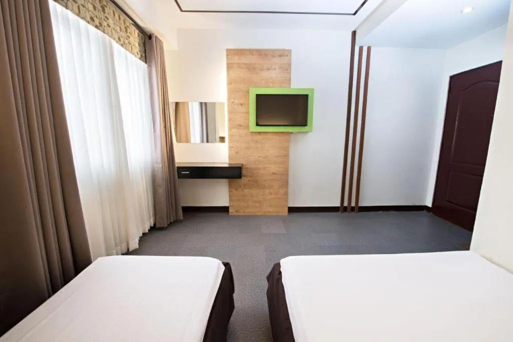 Bed in Hotel Henrico Kisad