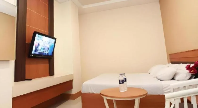 Bed in Plaza Hotel Tegal