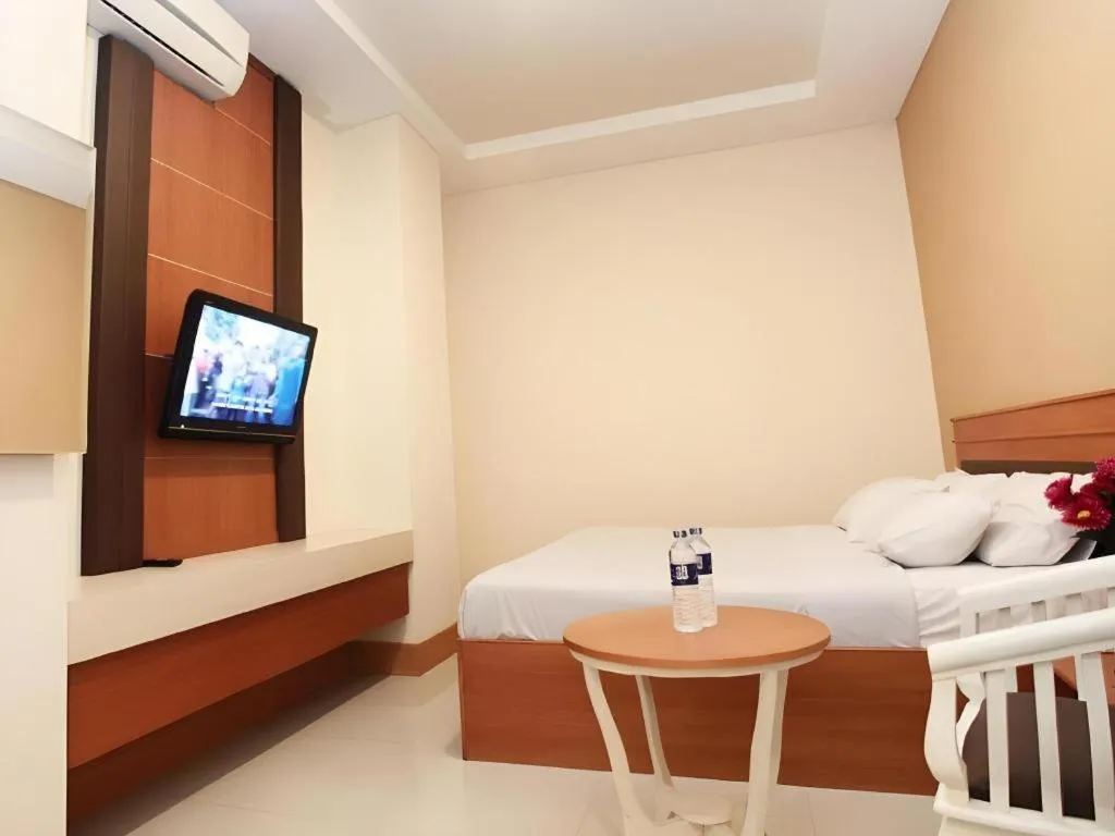 Bed in Plaza Hotel Tegal