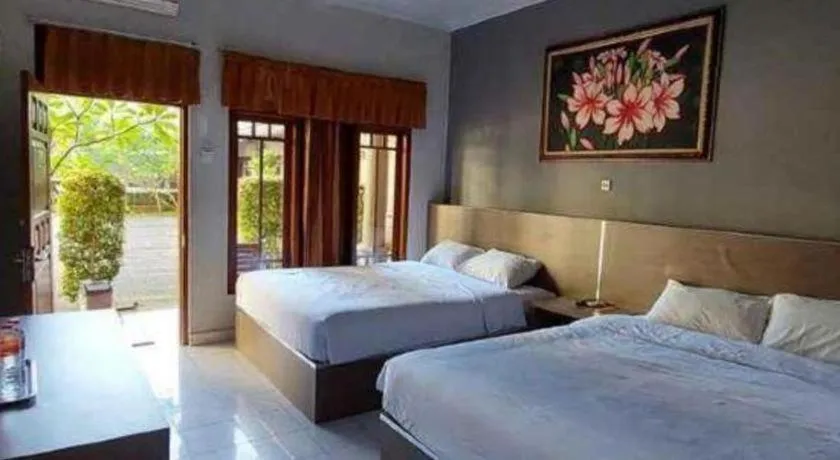 Bed in Grand Mutiara Hotel