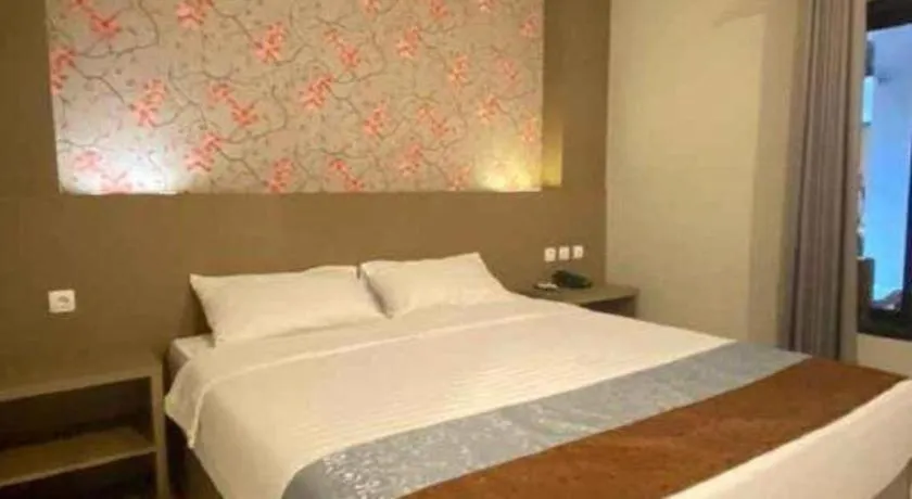 Bed in Grand Mutiara Hotel