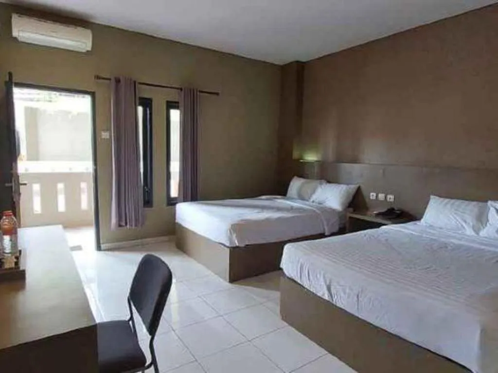 Bed in Grand Mutiara Hotel