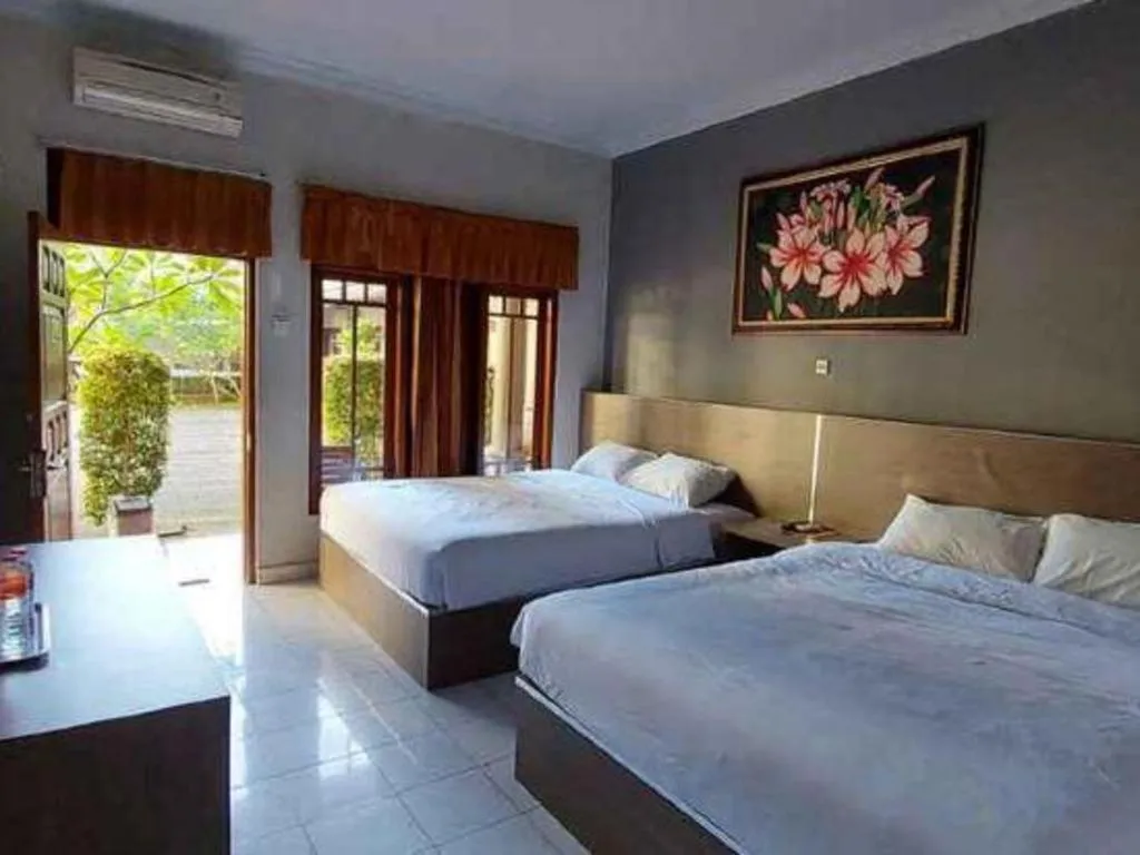 Bed in Grand Mutiara Hotel