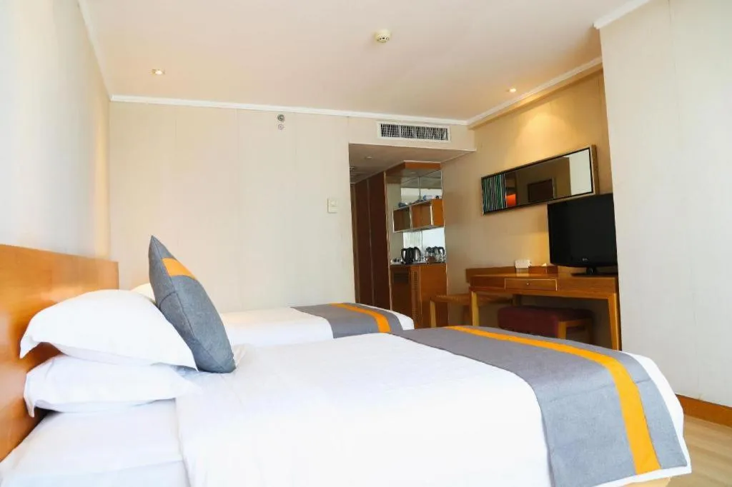 Bed in Golden Sea View Hotel Haikou