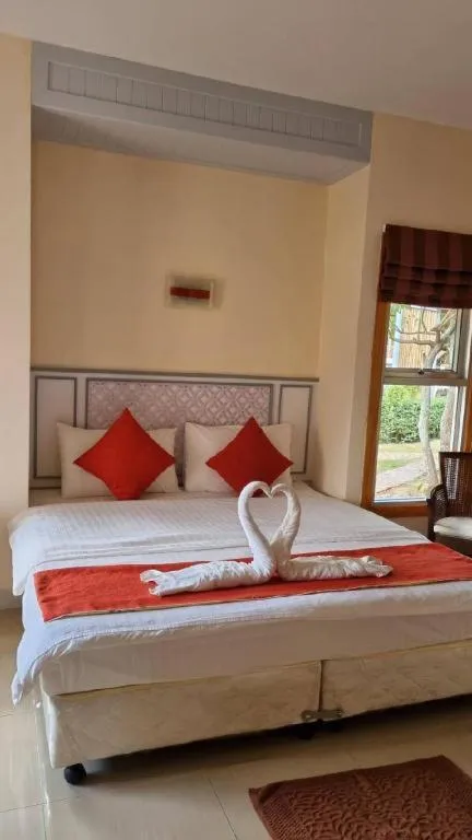 Bed in Dusit Talai Resort