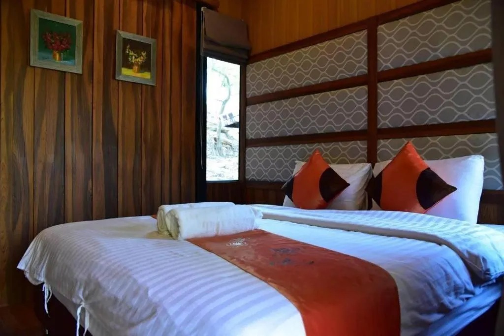 Bed in Dusit Talai Resort