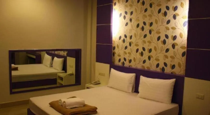 Bed in Sabai Ez Hotel