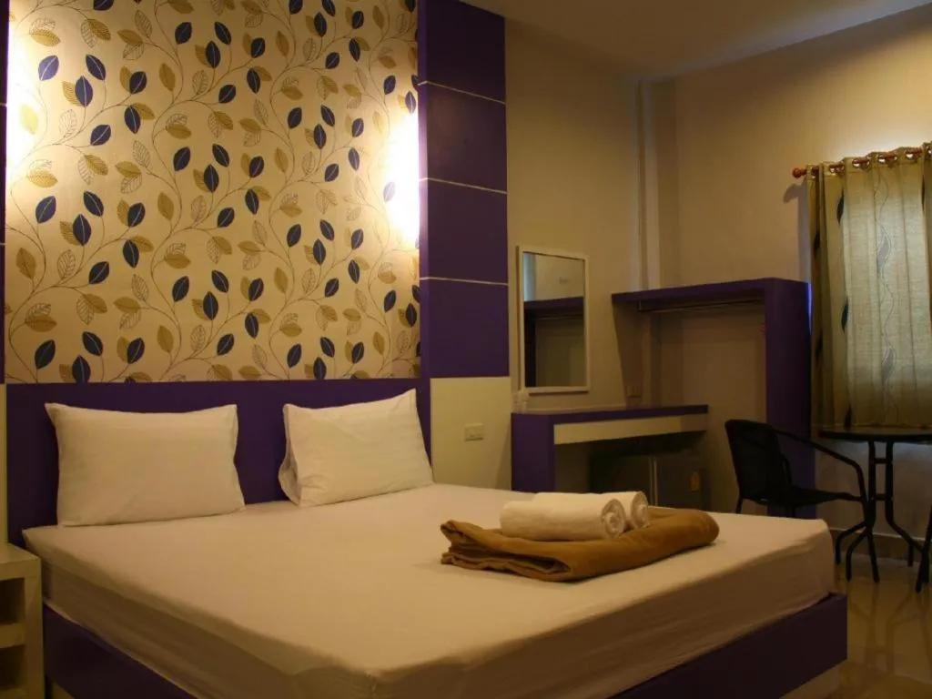 Bed in Sabai Ez Hotel