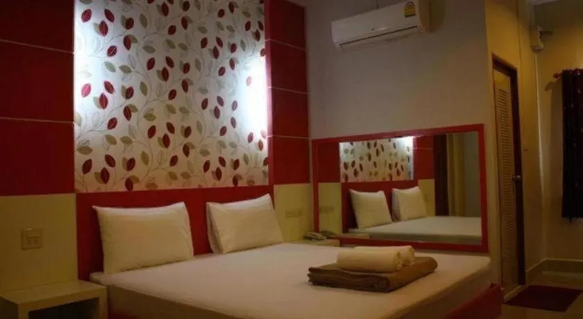 Bed in Sabai Ez Hotel