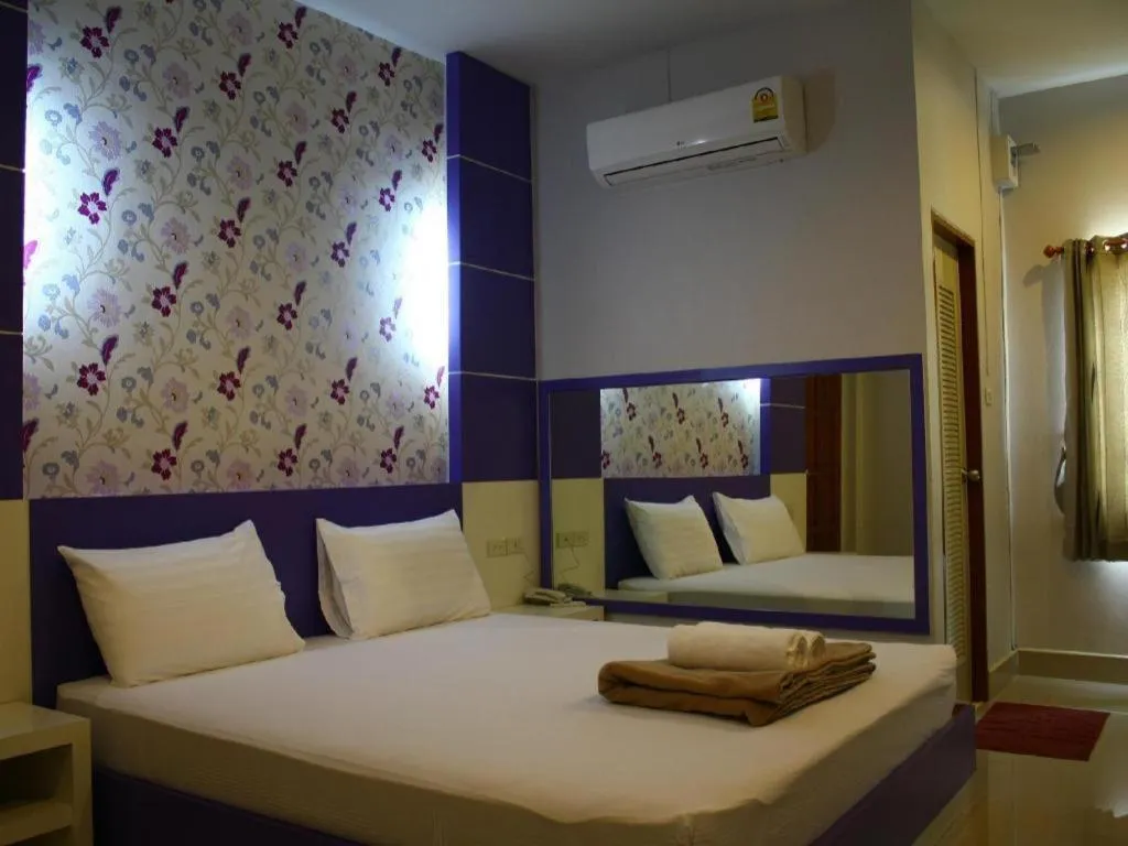 Bed in Sabai Ez Hotel