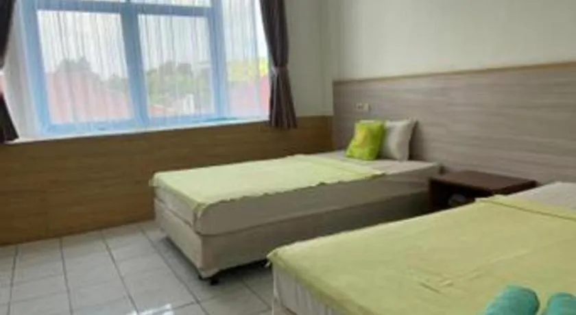 Bed in Hotel Huswah Airport