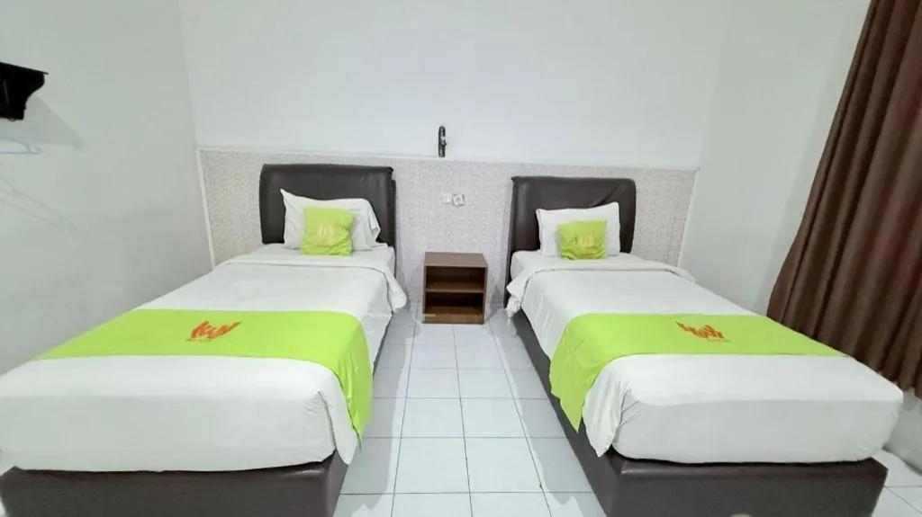 Bed in Hotel Huswah Airport