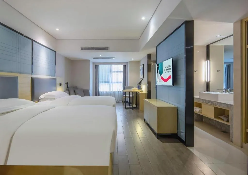 Bed in Echarm Hotel Beihai Railway Station