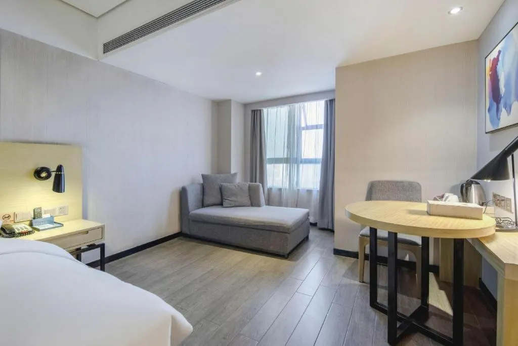 Bed in Echarm Hotel Beihai Railway Station