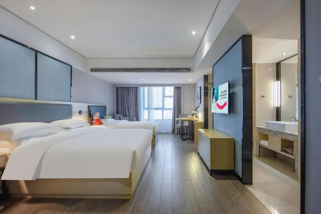 Bed in Echarm Hotel Beihai Railway Station