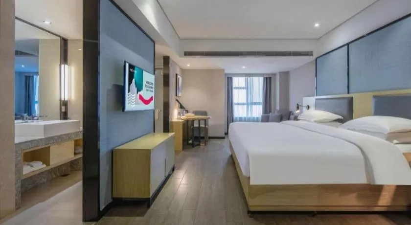 Bed in Echarm Hotel Beihai Railway Station