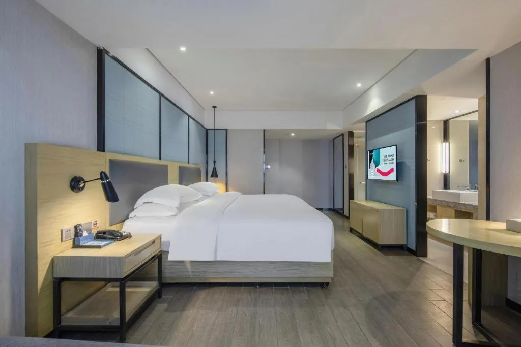 Bed in Echarm Hotel Beihai Railway Station