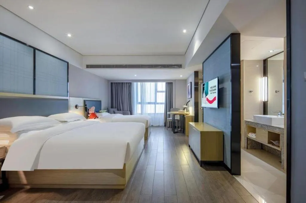 Bed in Echarm Hotel Beihai Railway Station