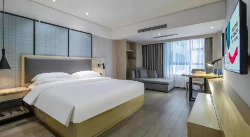 Bed in Echarm Hotel Beihai Railway Station