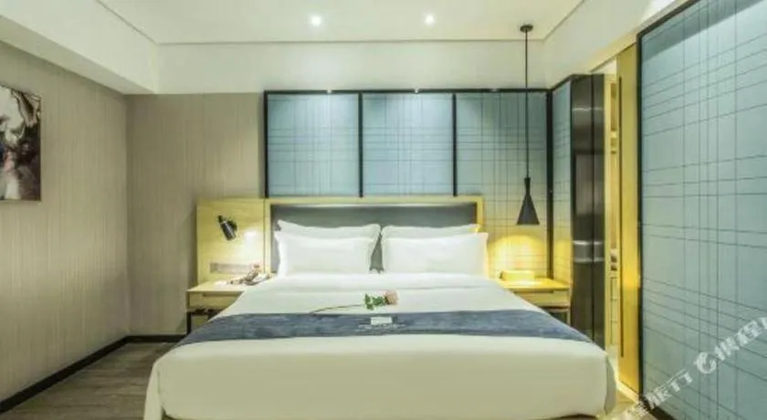 Bed in Echarm Hotel Beihai Railway Station