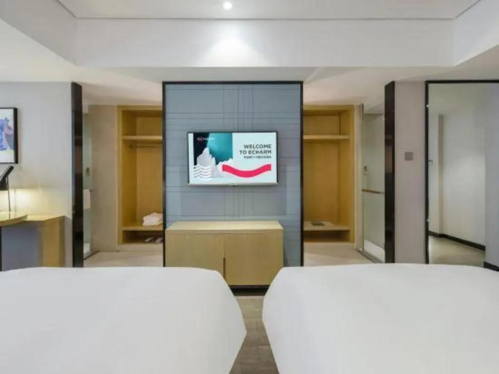 Bed in Echarm Hotel Beihai Railway Station
