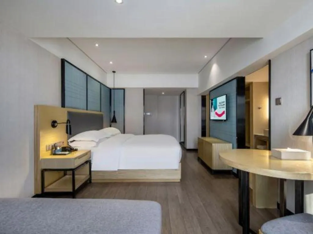 Bed in Echarm Hotel Beihai Railway Station