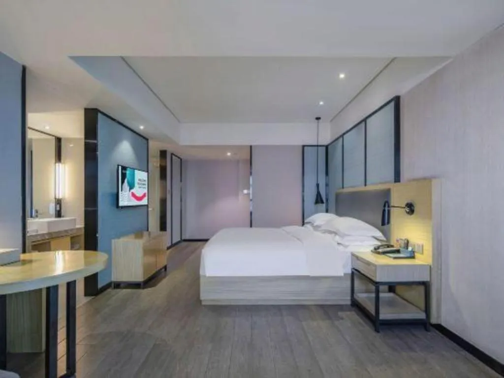 Bed in Echarm Hotel Beihai Railway Station