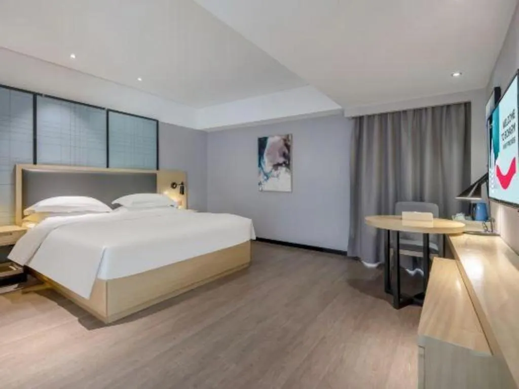 Bed in Echarm Hotel Beihai Railway Station