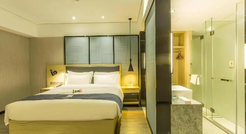 Bed in Echarm Hotel Beihai Railway Station