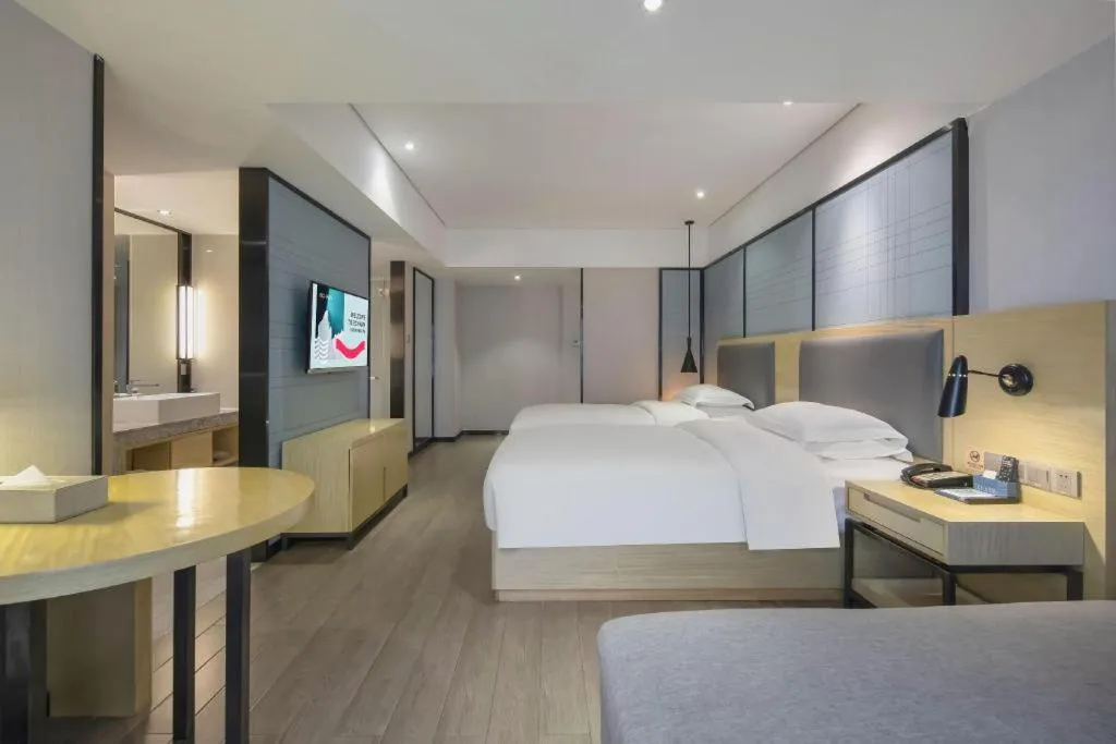 Bed in Echarm Hotel Beihai Railway Station