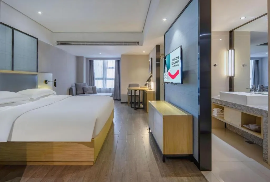 Bed in Echarm Hotel Beihai Railway Station