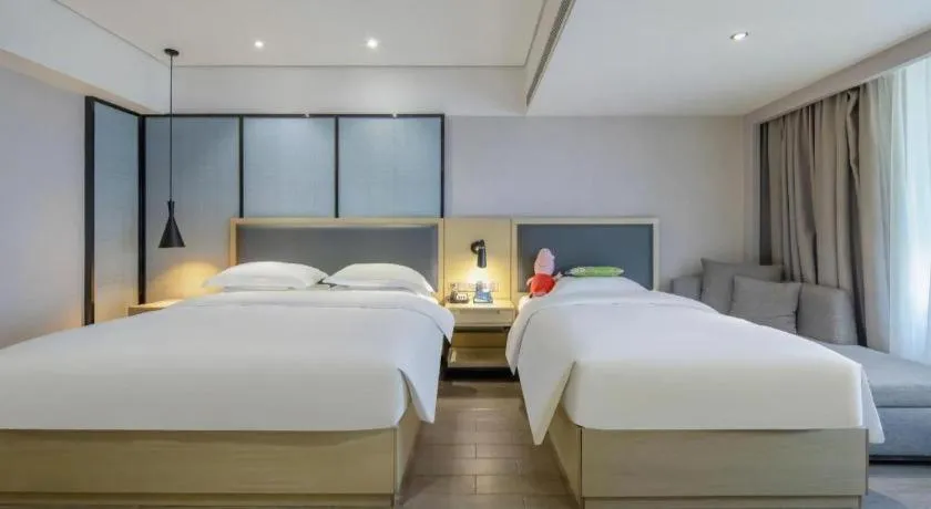 Bed in Echarm Hotel Beihai Railway Station