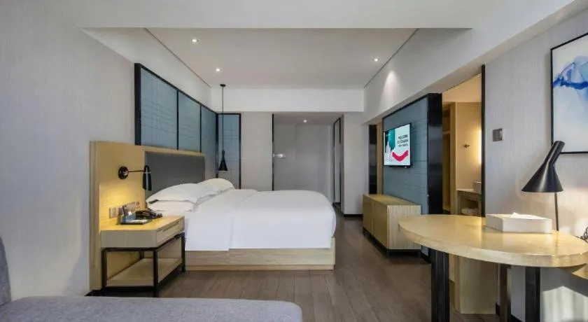 Bed in Echarm Hotel Beihai Railway Station