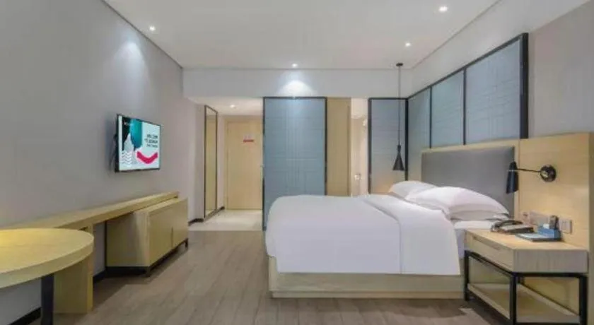 Bed in Echarm Hotel Beihai Railway Station