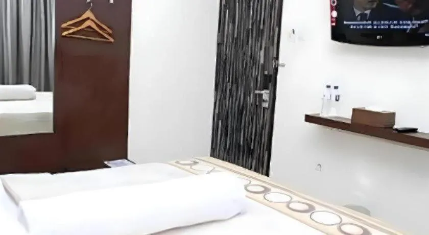 Bed in Vindhika Hotel