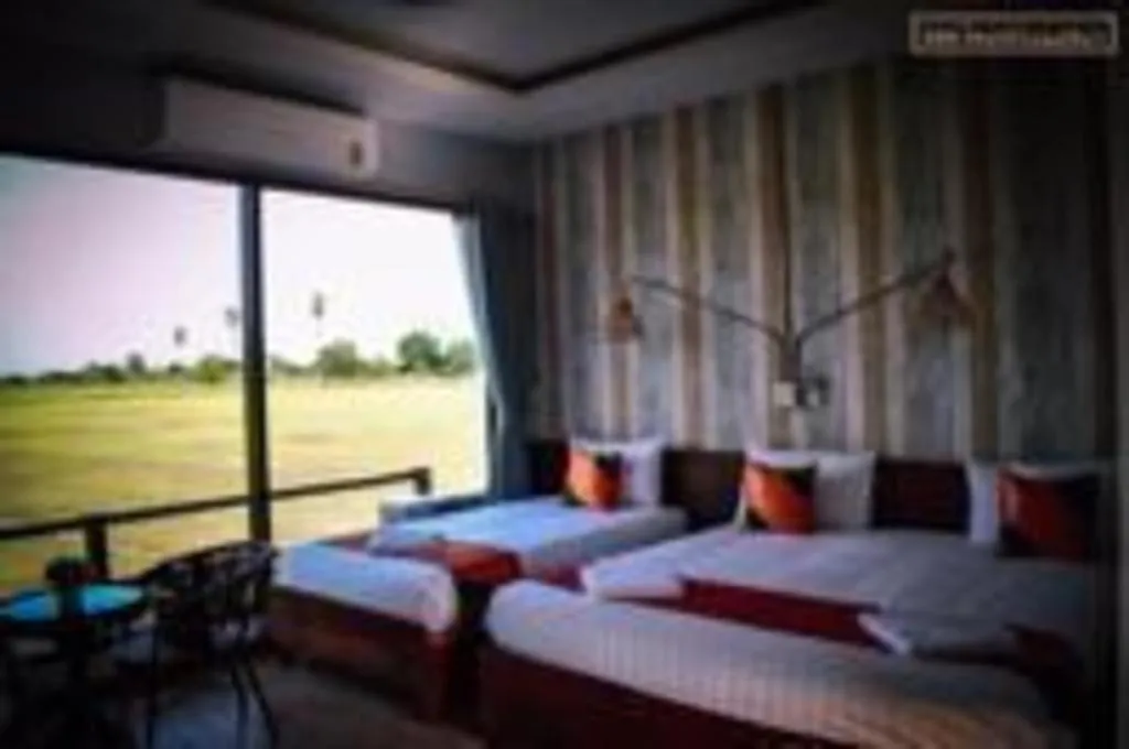 Bed in 111 Resort and Spa