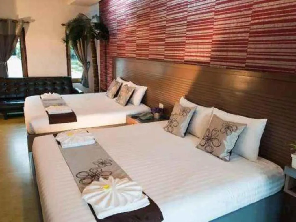 Bed in 111 Resort and Spa